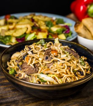 bowl-fried-stir-noodles-with-beefs-wooden-desk bowl-fried-stir-noodles-with-beefs-wooden-desk